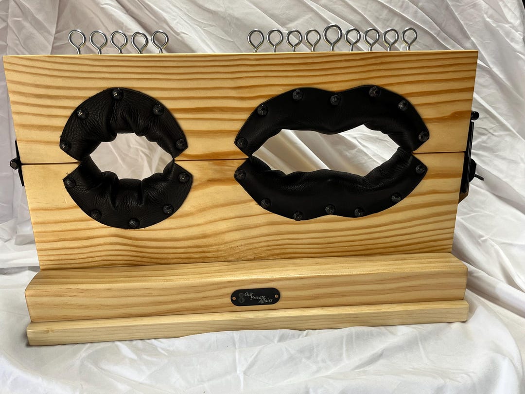 mature-stained-wood-lockable-padded-leather-foot-stocks-or-ankle