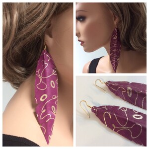 Molded leather,Magenta w/Gold Swirls Pattern. Hand made by Zoë Battles Design