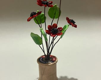 Red Glass Flowers in Vintage Wood Spool