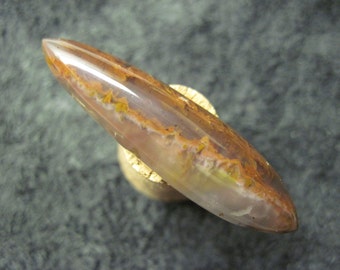 Red plume flame agate freeform cabochon from Nova Scotia