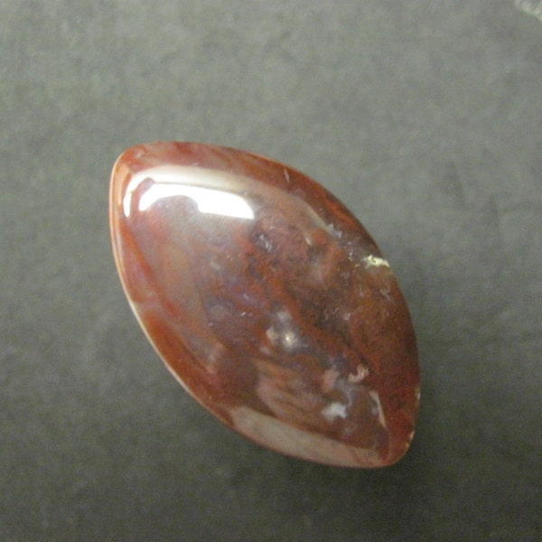 Red plume agate cabochon freeform