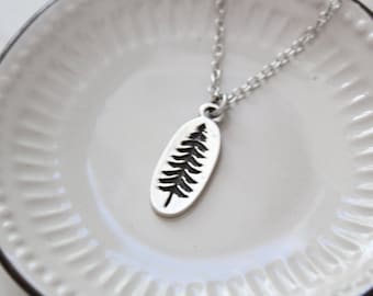 Antique silver tone pine tree necklace.  Simple stamped evergreen tree.  Nature lover gift.