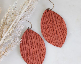 Genuine leather petal leaf earrings for Fall.  Patterned leather, orange, rust, dark orange.