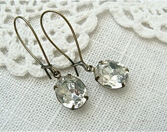 Antique brass clear glass vintage jewel earrings.