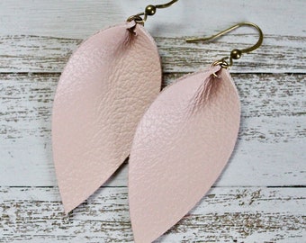 Handmade genuine leather leaf earrings. Pale pink color. Soft petal shaped earrings.