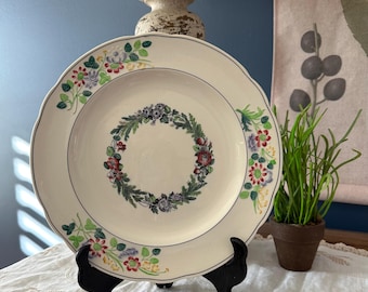 Plato llano vintage Copeland de Spode England con diseño de corona floral y borde floral en relieve.