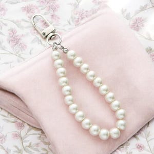 Llavero de perlas retro para mujer: abalorio para coche, bolso, mochila y pulsera de estilo coqueto con cuentas para teléfono