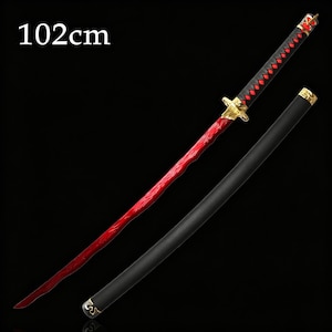 May include: A red and black katana sword with a black scabbard. The sword blade is red, and the handle is black with red diamond-shaped accents. The sword is 102cm long.