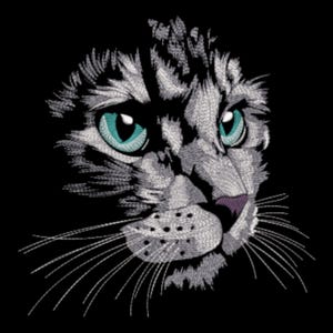 May include: Detailed embroidery of a cat's face, featuring striking teal eyes and a pink nose against a black background. The cat's fur is rendered in shades of gray and white, with long white whiskers.