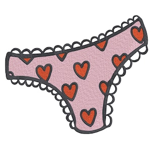 May include: Light pink underwear featuring a pattern of orange hearts. The edges are scalloped and outlined in black. The hearts also have black outlines. The underwear is a light pink colour.
