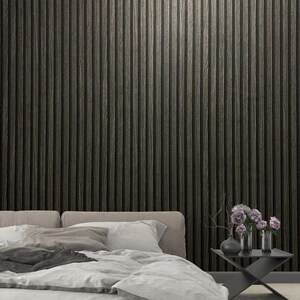 Peut inclure: Ensemble de trois tasses en céramique avec une finition mate et mouchetée. Les tasses sont de couleur crème, gris clair et gris foncé. Chaque tasse a un design simple et minimaliste.