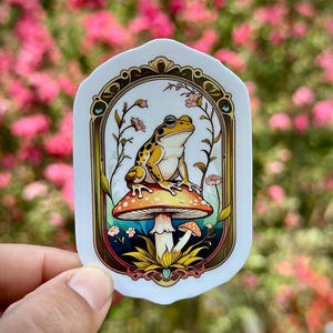 Frog sitting on a mushroom sticker