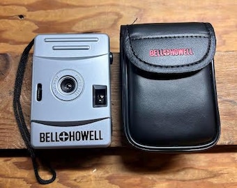Câmera de filme point & shoot Bell and Howell Focus Free 28 mm com estojo