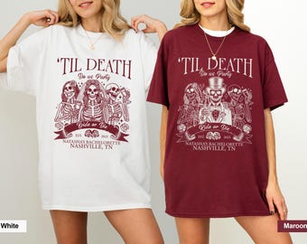 May include: White and maroon t-shirts featuring a skeleton design. The text on the shirts says "'Til Death Do Us Party" and "Bride or Die". The shirts are for Natasha's Bachelorette in Nashville, TN, EST. 2025.