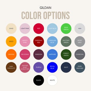 Op de afbeelding: Gildan kleurenkaart met diverse kleuropties, waaronder rood, blauw, groen en roze, elk gepresenteerd in een cirkel met de kleurnaam eronder.