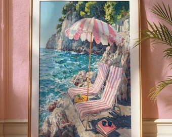 May include: Framed art print of a coastal scene. The painting depicts two striped beach chairs under a pink and white striped umbrella on a rocky shore. The turquoise sea meets the cliffs in the background. A book and sunglasses rest nearby.