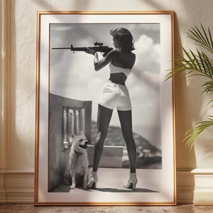 Vintage Rifle Girl Wall Art | Black and White Photo Print | Retro Woman with Dog | Bold Feminine Decor | Glamorous Pin-Up Poster