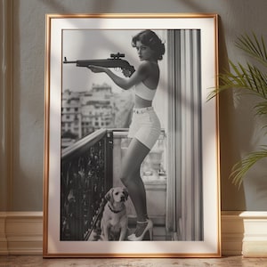 Vintage Woman with Rifle and Dog–Black and White Wall Art-Retro Pin-Up Style Poster-Bold Feminine Decor | Humorous Hollywood-Inspired Print