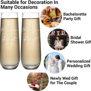 May include: Two clear champagne flutes filled with a bubbly beverage. Each glass is personalized with the names "Maria & Robert" and the date "05.15.74" in white script. The image text says "Suitable for Decoration In Many Occasions".