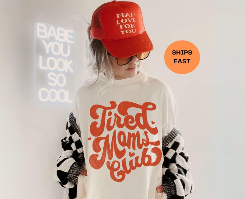 Tired Moms Club Shirt

This Comfort Colors® Mom Shirt is for the overstimulated, sleep-deprived heroes—aka you. The Tired Moms Club just got a uniform. This trendy mom shirt is the ultimate mom life shirt and perfect mom appreciation gift. Whether you're a new mom or just running on caffeine and chaos, this cozy shirt for moms says it all. Great Mother’s Day gift, gift for mom, or shirt for mama who needs a break.