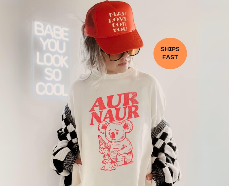 Stay cool in this Aur Naur Koala Australian Accent Shirt—a funny shirt for women or friend from Australia with a playful retro vibe. This boho tee doubles as a trendy aesthetic tshirt and oversized graphic tee, making it perfect for everyday style or a cheeky sarcastic gift for her. Great as a birthday gift, Christmas gift, or best friend gift idea, this fun graphic tee is a must-have for anyone who loves 90s style, retro humor, and cool casual fashion.