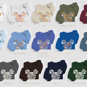 Pu&ograve; includere: Un set di 14 maglie a maniche lunghe con un design floreale di Topolino. Le maglie sono disponibili in una variet&agrave; di colori, tra cui bianco, cenere, sabbia, verde militare, marrone, azzurro, blu carolina, blu heather sport, blu reale, blu indaco, antracite, cioccolato fondente, blu navy e verde bosco.