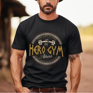 A man wearing a black t-shirt with a graphic design on it.