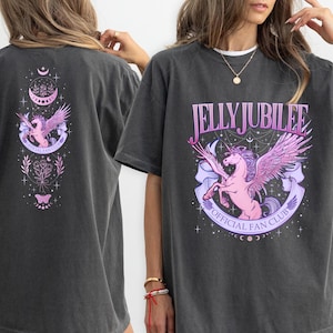 May include: A dark gray oversized t-shirt with a graphic print of a pink unicorn with wings and the text "Jelly Jubilee Official Fan Club".