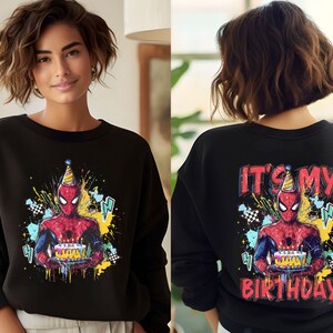 A woman wearing a black sweater with a Spiderman graphic and the text "It's my birthday" printed on the back.