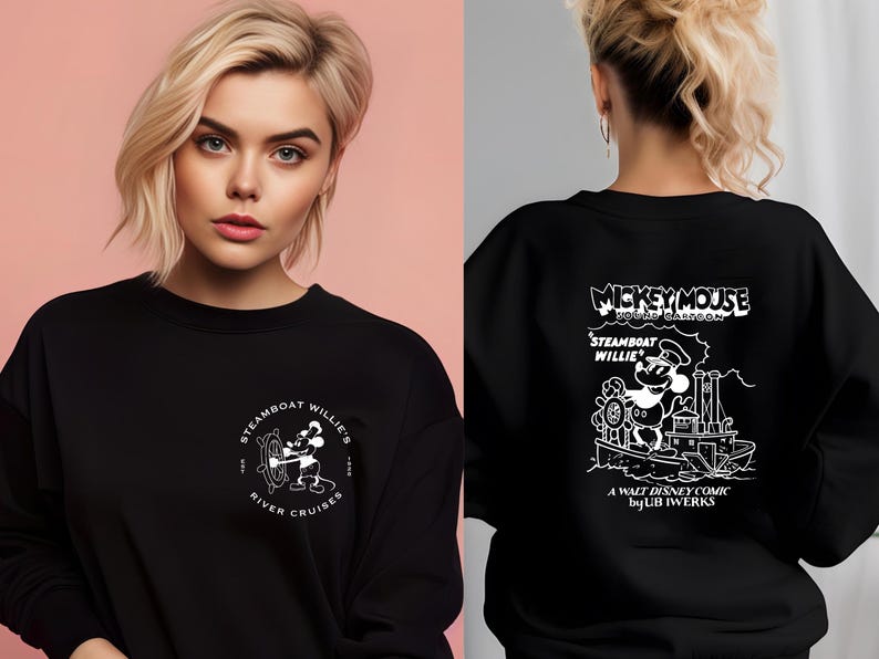 May include: Black sweatshirt with a white graphic of Mickey Mouse on a steamboat. The graphic includes the text "Mickey Mouse", "Steamboat Willie", "A Walt Disney Comic by UBB IWERKS", and "River Cruises".