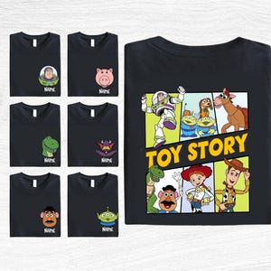 a collection of black t-shirts featuring various cartoon characters from the Toy Story franchise, including Woody, Buzz Lightyear, and other beloved characters.