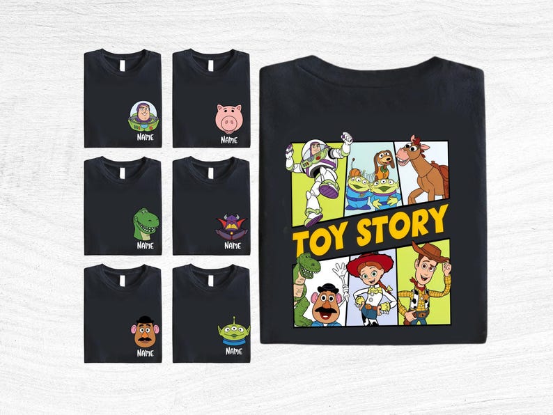 a collection of black t-shirts featuring various cartoon characters from the Toy Story franchise, including Woody, Buzz Lightyear, and other beloved characters.