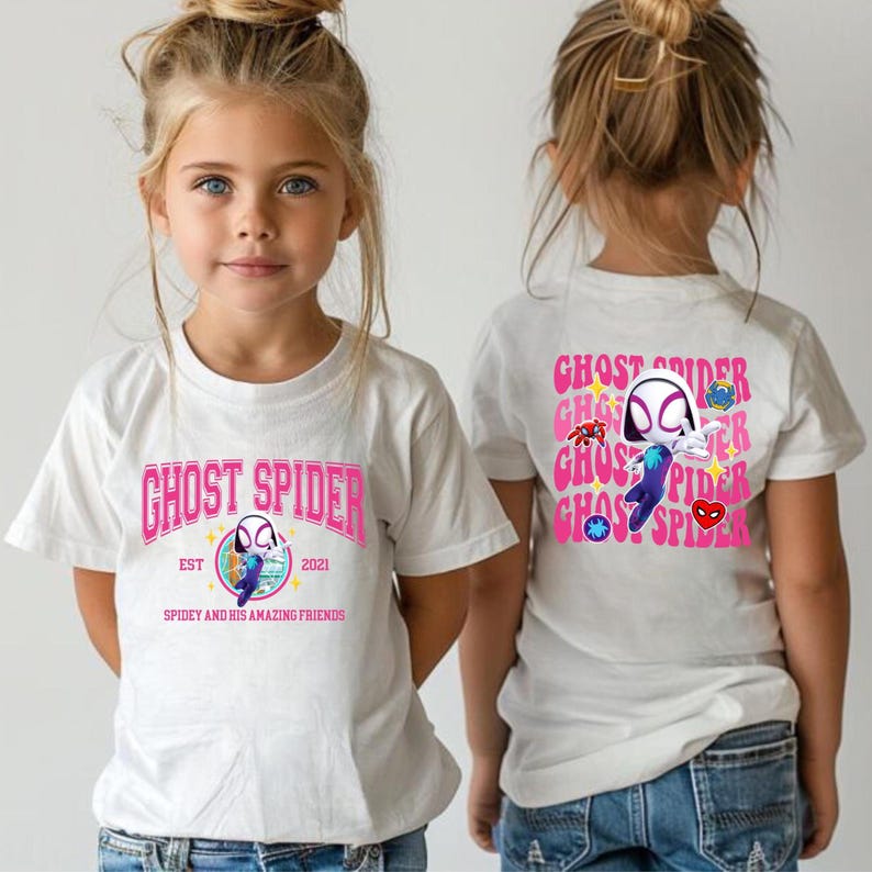 two young girls wearing white t-shirts with the text "GHOST SPIDER" printed on them.