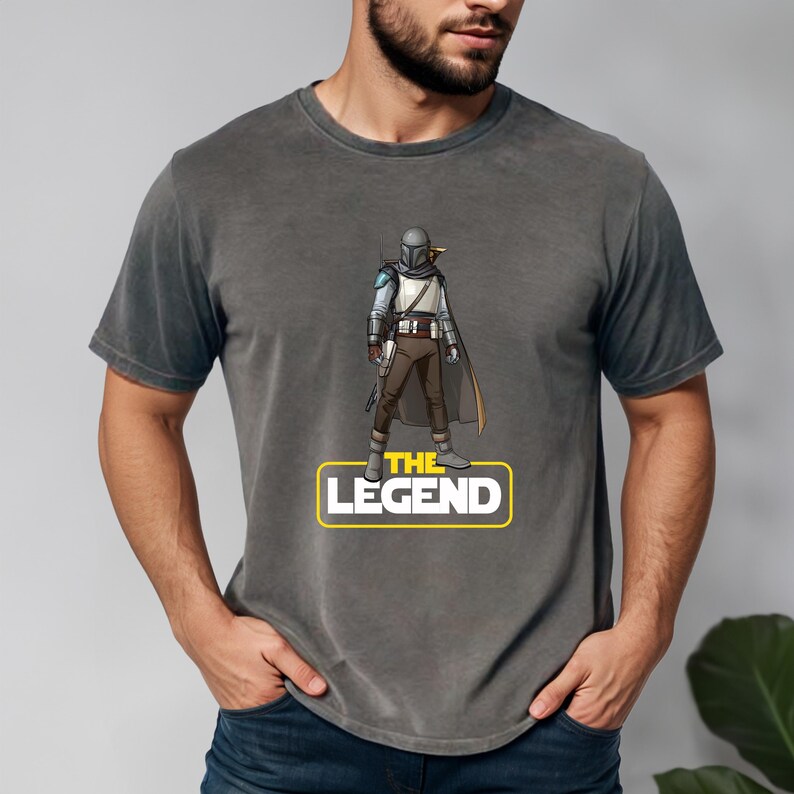 a man wearing a star wars t - shirt that says the legend
