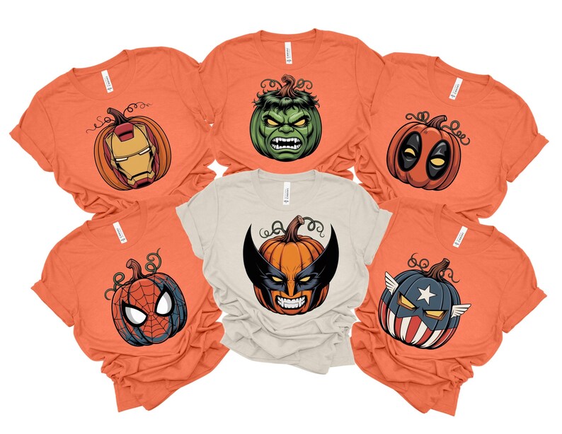 a collection of orange t-shirts with various Halloween-themed designs, including a Hulk, a Deadpool, Spider-Man, and an American flag.
