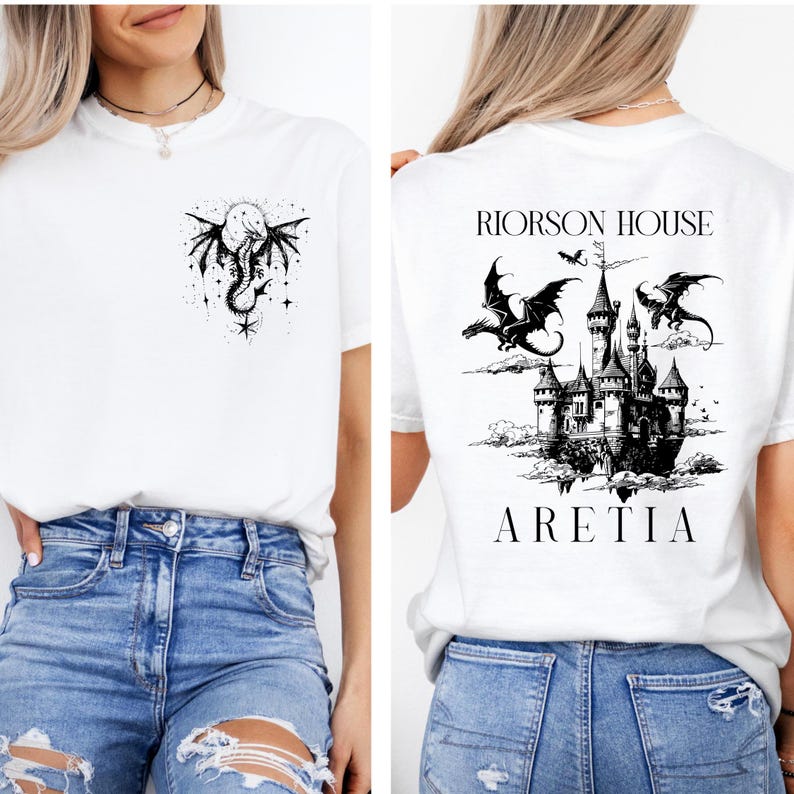 May include: White t-shirt with a black dragon and moon graphic on the front. The back of the shirt features a castle design with dragons and the text "RIORSON HOUSE ARETIA".