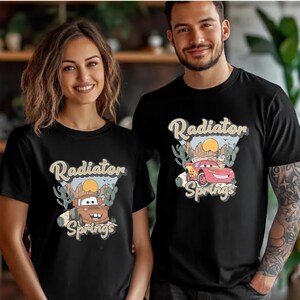 a man and a woman wearing matching shirts