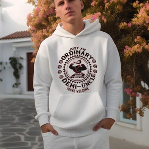 May include: A white ceramic mug with a black handle and the text "But First, Coffee" in a black, bold font. The mug is on a wooden surface. The mug is approximately 10 cm tall.