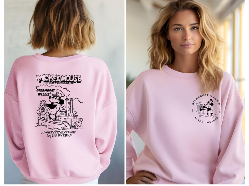 May include: Pink sweatshirt with a black and white graphic of Mickey Mouse on a steamboat. The text "Mickey Mouse Steamboat Willie" is printed above the graphic. The text "A Walt Disney Comic by UB Iwerks" is printed below the graphic.