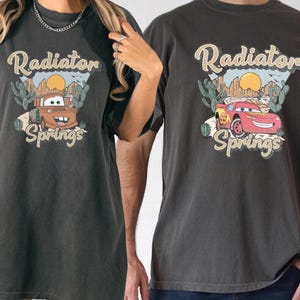 a man and a woman standing next to each other