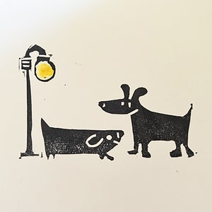 Hunde und Laternenpfahl Linoldruck