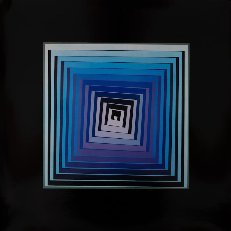 May include: Abstract art print featuring a series of nested squares in shades of blue, purple, and black, creating a visual illusion of depth. The artwork is framed with a white border and set against a black background.