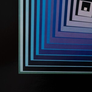 May include: Abstract geometric art print featuring a square spiral design in shades of blue, purple, and black. The artwork has a modern aesthetic with clean lines and a minimalist style. The color palette creates a sense of depth and visual interest.