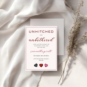 May include: A white card with a red border and the text "Unhitched and Unbothered" in red. The text "Join us for a night of laughter, love, and letting go!" is in black. The name "Samantha Prutt" is in pink. The date "October 18th @ 6pm" and the address "123 Anywhere Street, Any city" are in black. There are three small hearts in the bottom right corner of the card.