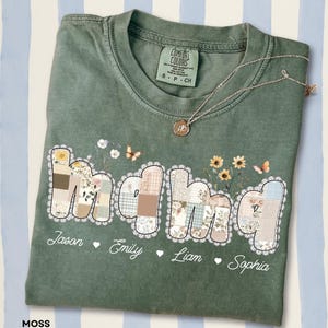 Puede incluir: Un juego de tres tazas de cerámica con un acabado mate moteado. Las tazas son en tonos crema, gris claro y gris oscuro. Cada taza tiene un diseño simple y minimalista, ideal para café o té.