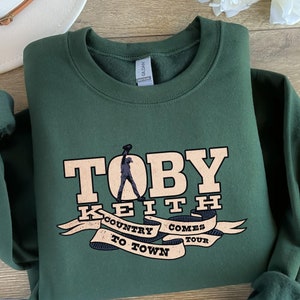 Toby Keith Tee, Toby Keith Sweatshirt, Toby Keith RIP, Country Music, Music Legend, Christmas Gift, Gift For Mom, Gift For Dad,Been a Cowboy
