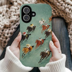 May include: A phone case featuring a vintage painting of a horse race. The case has a teal background with multiple horses and jockeys in various colors. The phone case has a black camera lens.