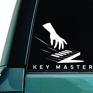Sleutelmeester: sticker pianist, sticker pianospeler, sticker muzikant laptop, sticker pianospeler, sticker autoruit muziek