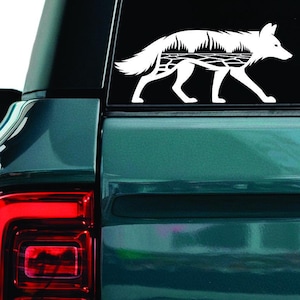 Calcomanía de Coyote Salvaje: Adhesivo de vinilo resistente a la intemperie para portátil, coche y ventana.