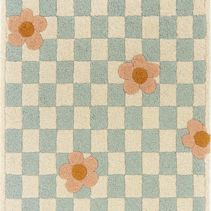 Könnte beinhalten: Rechteckiger Teppich mit einem Schachbrettmuster in Hellblau und Creme. Große, stilisierte Blüten in Pfirsich mit gelben Zentren sind über die Oberfläche verteilt. Der Teppich hat ein weiches, strukturiertes Aussehen.